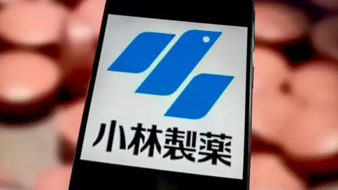 File picture of logo of Kobayashi Pharmaceutical displayed on smartphone.
