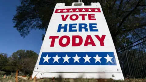 Getty A sign outside a voting station in the U.S. that reads "vote here today".