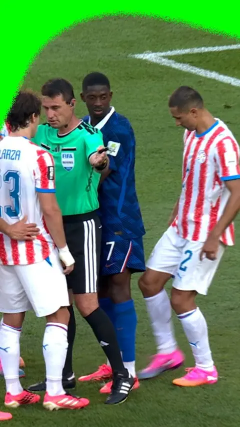 Paraguay players confront the referee at the 2026 World Cup