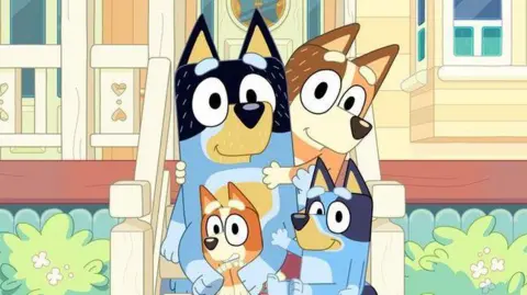 Ludo Studio Bluey and family outside their house, a shot from the children's animation