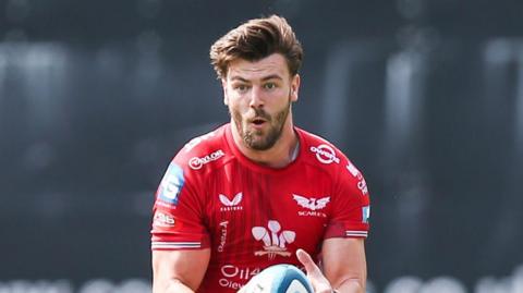 Scarlets centre Johnny Williams in action against Ulster