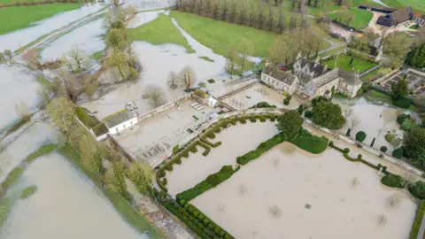 National Trust Images Avebury Manor in floodwater 