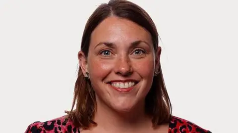 Welsh government A head and shoulders portrait picture of Heledd Fychan smiling.