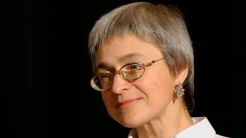 Getty Images Anna Politkovskaya was shot dead in the lift of her Moscow house in 2006.