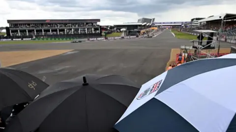 EPA Fans with umbrellas at Silverstone