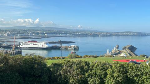Overlooking Douglas bay, with the Manxman ferry in the harbour and clear blue skies