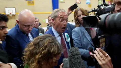 PA Media Nigel Farage