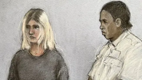 PA Media Court sketch of Virginia McCullough, who is stood next to a dock officer