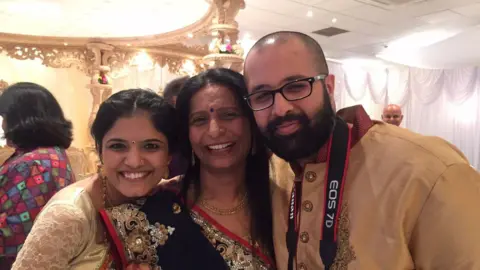 Raxa, middle, with Jay Bapodra and Jays wife Rina Bapodra
