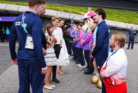 PA Media The royal family meet a row of Commonwealth Games volunteers outside the Hydro in Glasgow