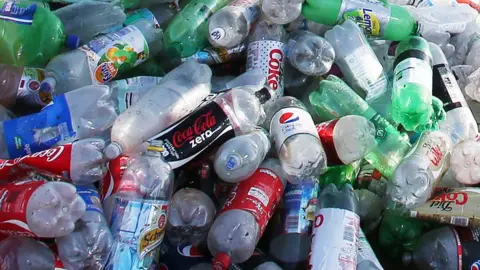 Generic picture of a pile of plastic soft drink bottles