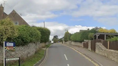 Google Maps A Google Maps image showing a residential road with houses either side and double yellow lines on the right hand side
