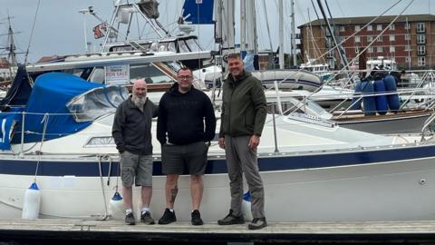 Three members of Brierli yacht's crew