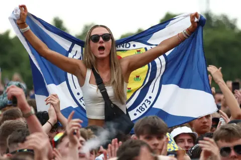 Getty Images Music fans watch The Courteeners perform on day two of the TRNSMT Festival 2024 at Glasgow Green on July 13, 2024 in Glasgow, Scotland.