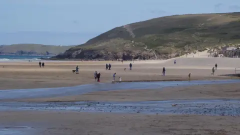 BBC Beach in Cornwall people walking