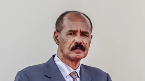 AFP Eritrean President Isaias Afwerki pictured wearing a suit and tie