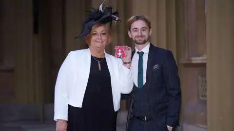 PA Media Suzanne Richards and her son Owen