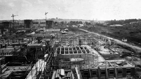 Cardiff and Vale health board An archive photo of the University Hospital of Wales in Cardiff, while it was being built in the late 1960s. Construction site, scaffolding and cranes in the distance