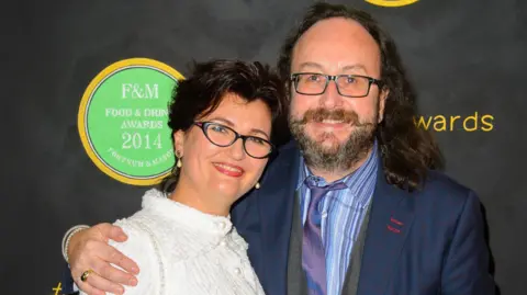 PA Media Dave Myers and his wife Lillian arriving at the Fortnum & Mason Food and Drink Awards,