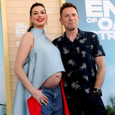 Reuters Anne Hathaway and Ewan McGregor posing together on the red carpet