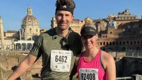 Family handout Couple Krissi and Sam Nesbitt ahead of the Rome Marathon