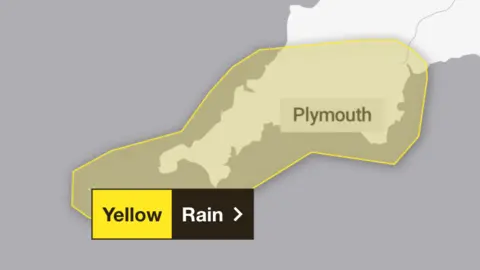 A map of Devon and Cornwall. A grey box which says "Plymouth" is on it. There is a yellow shape over Devon and Cornwall. With a yellow and black box that says "Yellow" and "Rain".