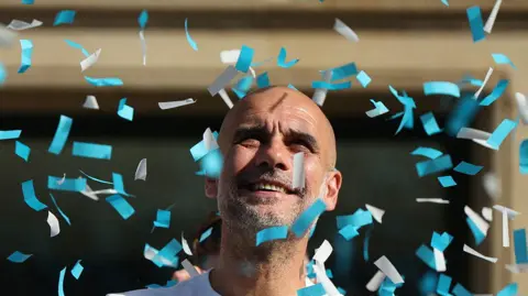 Reuters Manchester City manager Pep Guardiola during the victory parade