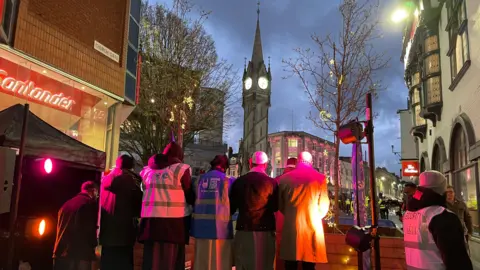 Leicester clocktower behind a stage where the mass Iftar was held