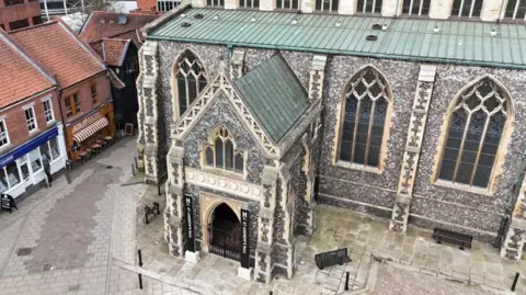 The outside of The Halls in Norwich, looking down from above.