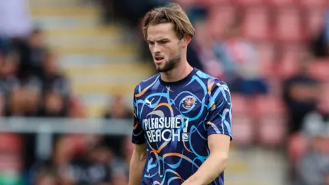 Dan Sassi in action for Blackpool