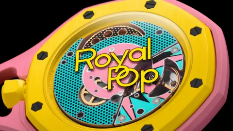 010a5550-511a-11f1-8108-5b7f076d1ee7.jpg Massive queues shut Swatch stores as hundreds clamour for £335 limited edition watch