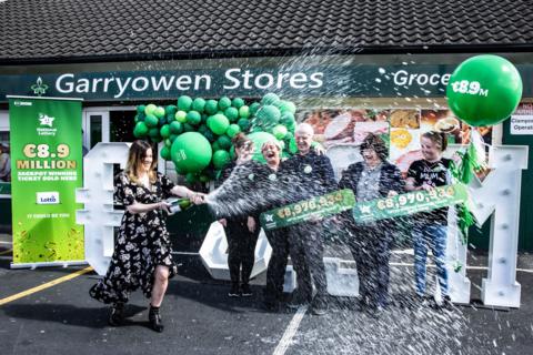 Staff at Garryowen Stores celebrate 