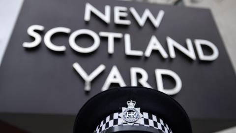 A Metropolitan police officer outside New Scotland Yard in London