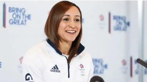 PA Media A woman, Jessica Ennis-Hill, appears at an athletics media event. She smiles as she speaks