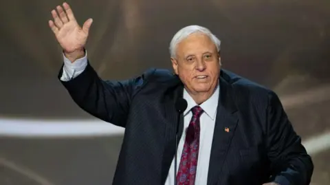 Getty Images Jim Justice waves to Congress