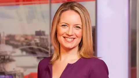 BBC Beccy Barr reading the news for BBC North West Tonight