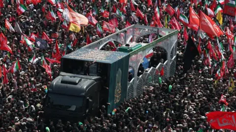 Iranians take part in the funeral ceremony of the late Iranian Supreme Leader Ayatollah Ali Khamenei in Tehran, Iran