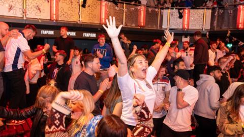 Fans celebrating England's win