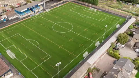 An aerial image of Buxton FC's Silverlands Stadium in Buxton, Derbyshire