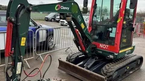 Northamptonshire Police Plant machinery with a drivers cab and a drilling element