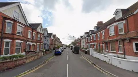 A residential street. 