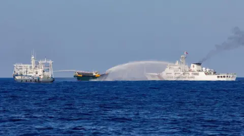 Reuters Chinese Coast Guard vessels fire water cannons towards a Philippine resupply vessel Unaizah May 4 on its way to a resupply mission at Second Thomas Shoal in the South China Sea, March 5, 2024. 