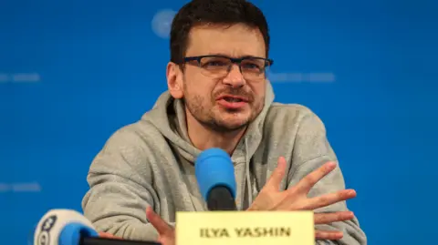 EPA Ilya Yashin speaks at a press conference