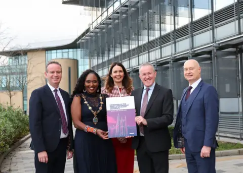 Derry City and Strabane District council Pictured at Ulster University's Derry~Londonderry campus at the launch of the Magee Expansion Taskforce's final report and Action Plan are (l-r) Stephen Kelly, Chair of the Magee Taskforce; Cllr Lilian Seenoi Barr, Mayor of Derry City and Strabane District Council; Nicola Skelly, Vice Chair of the Magee Taskforce; Economy Minister Conor Murphy; and Professor Paul Bartholomew, Vice-Chancellor of Ulster University.