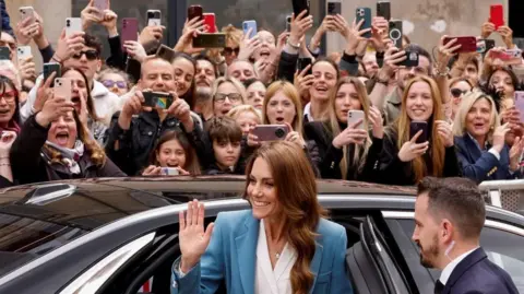 Reuters Catherine greeting crowds at Reggio Emilia