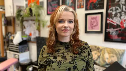 BBC/Becki Bowden Holly Dosdale looking at the camera. 