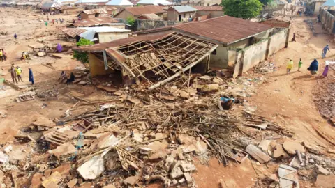 Gift Ufuoma Piles of rubble in Mokwa town