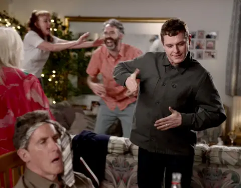 Stephen Fildes/BBC Mathew Horne dancing astatine  a party