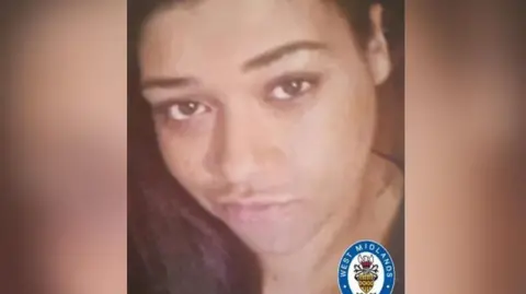 West Midlands Police Woman with dark brown hair