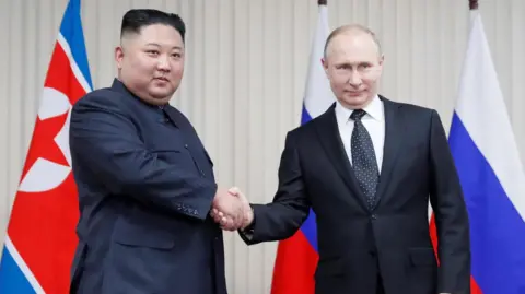 路透社金正恩与普京于 2019 年握手